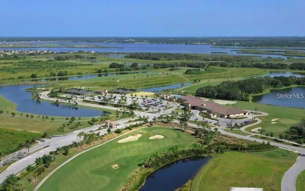 a view of a city with an ocean