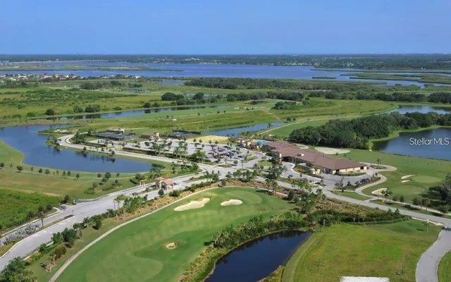 a view of a city with an ocean
