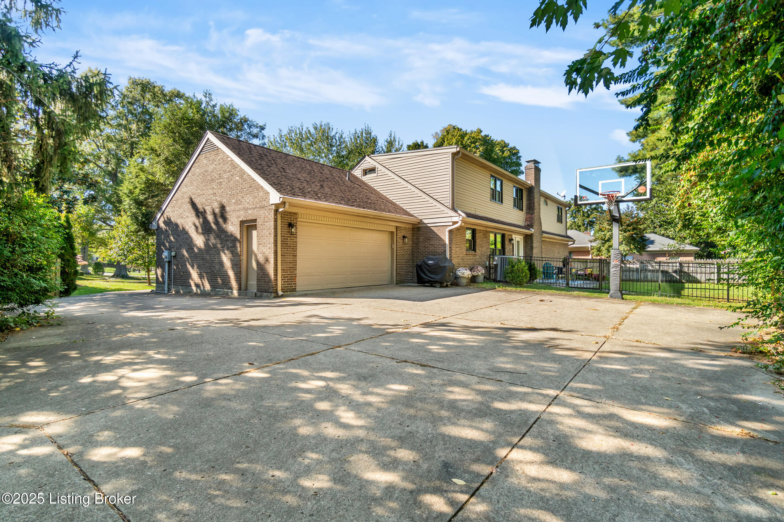 2903 Lightheart Road Louisville, KY 40222 - Photo 41 of 48 If you have small children, imagine them riding their bikes, playing ball, or creating scenes with chalk on this spacious, hardscape area.