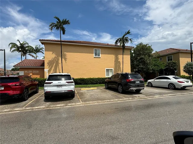 a car parked in front of a house