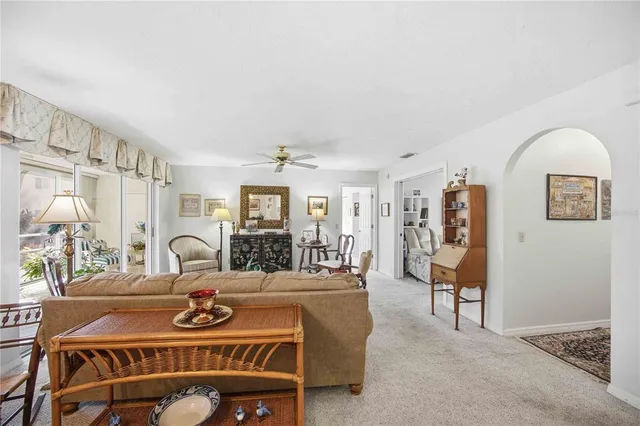 a view of kitchen sink with granite countertop cabinets