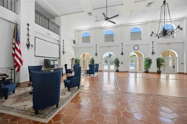 a view of living room with kitchen and furniture