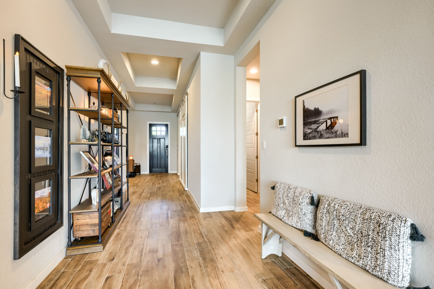 621 Rancho Sienna Loop Georgetown, TX 78628 - Photo 6 of 28 Step into this welcoming entrance foyer featuring plank flooring and recessed lighting.