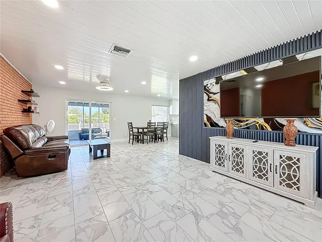 a view of a livingroom with furniture