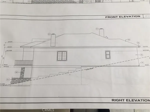 a bathroom with a granite countertop sink and a white cabinet