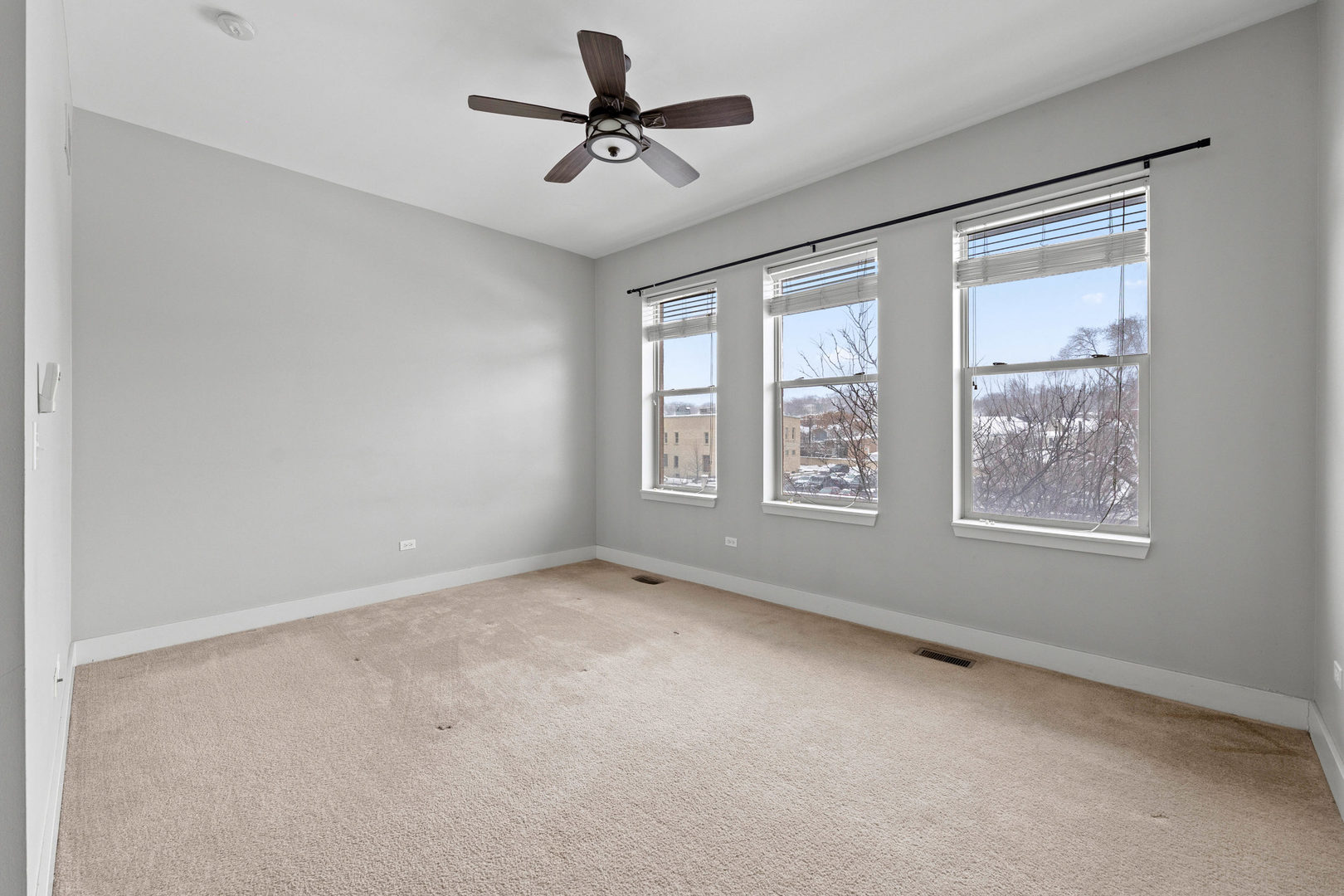 345 Front Street, Unit 2209 Lemont, IL 60439 - Photo 12 of 22 a view of an empty room with a window