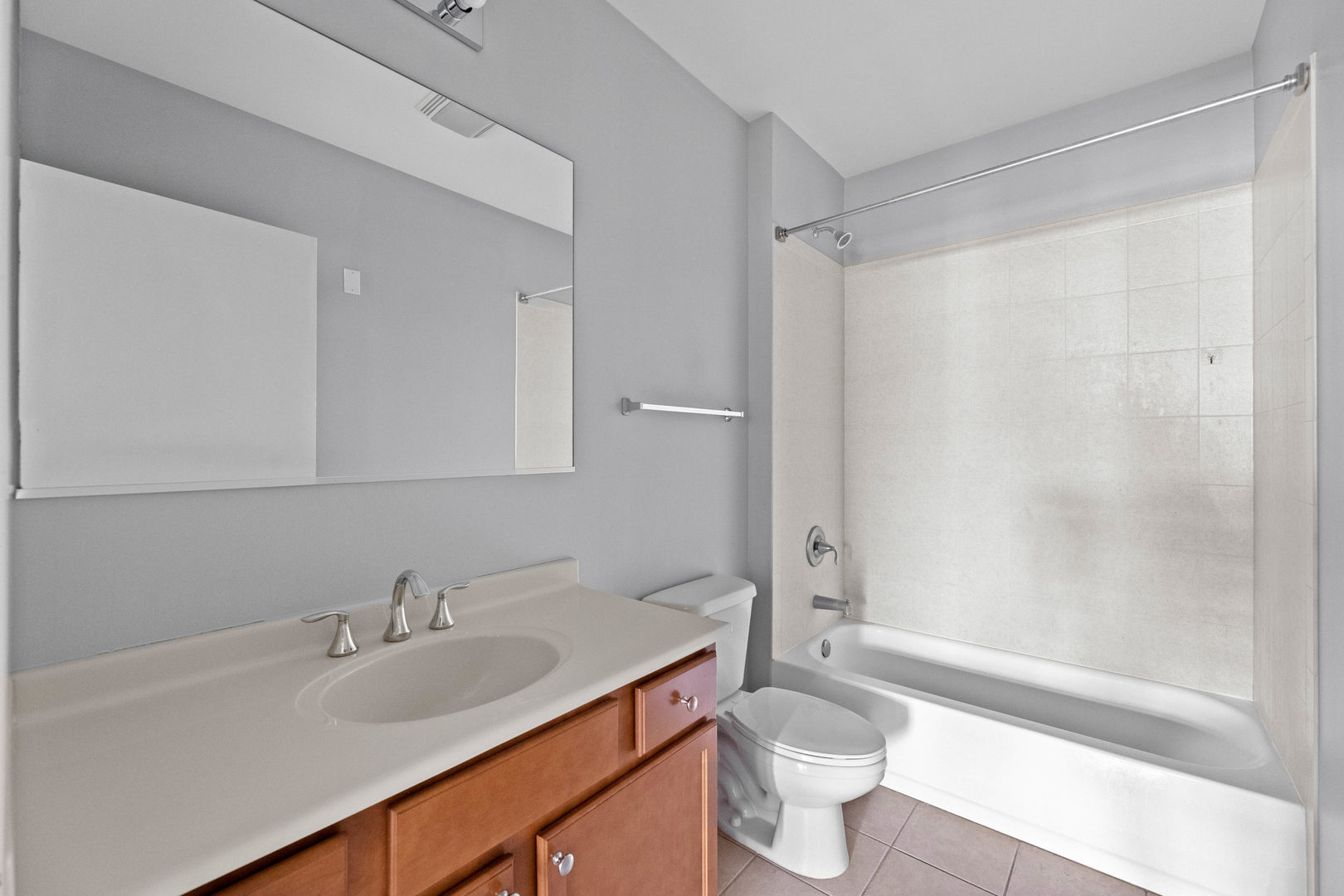 345 Front Street, Unit 2209 Lemont, IL 60439 - Photo 18 of 22 a bathroom with a sink toilet and shower