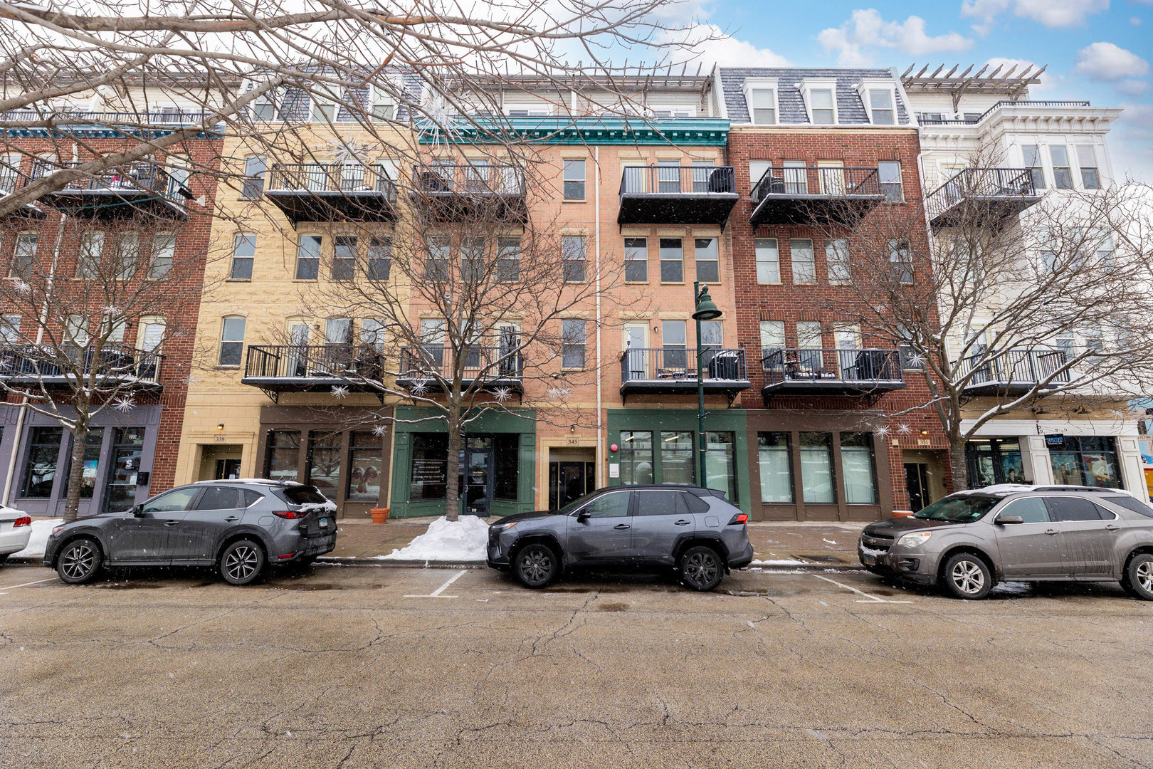 345 Front Street, Unit 2209 Lemont, IL 60439 - Photo 22 of 22 a car parked in front of a building