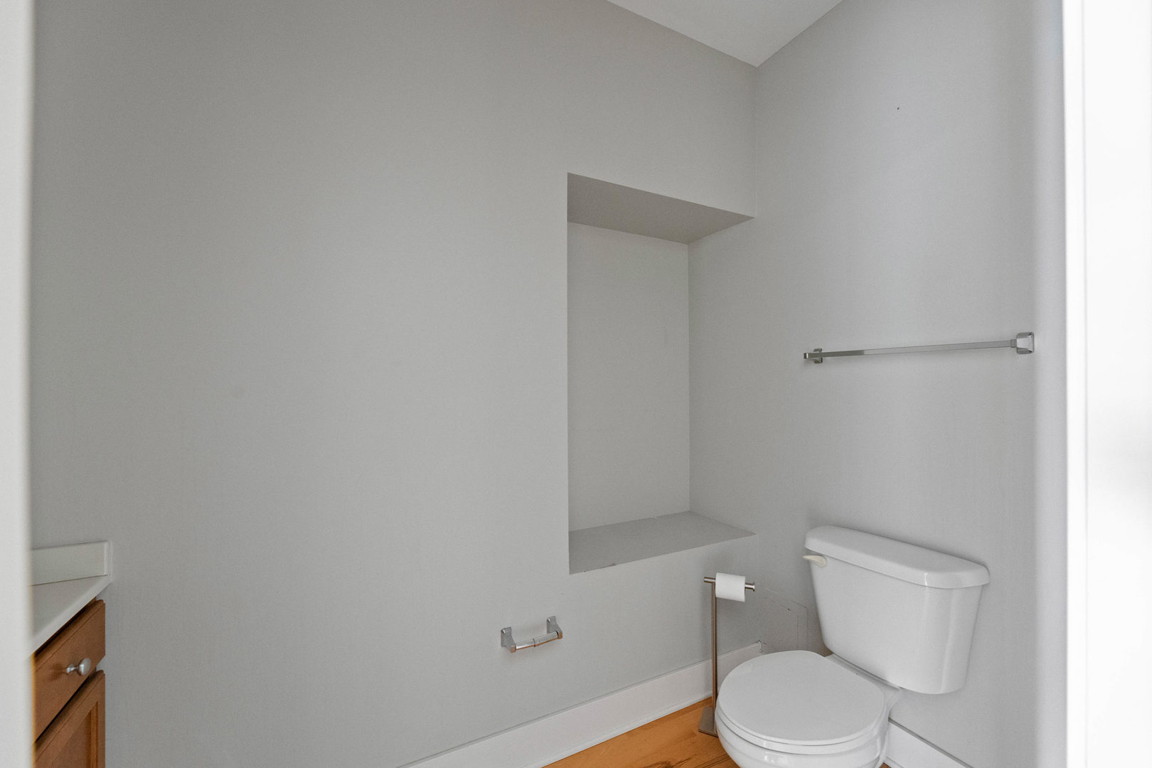 345 Front Street, Unit 2209 Lemont, IL 60439 - Photo 10 of 22 a white toilet sitting next to a bath tub