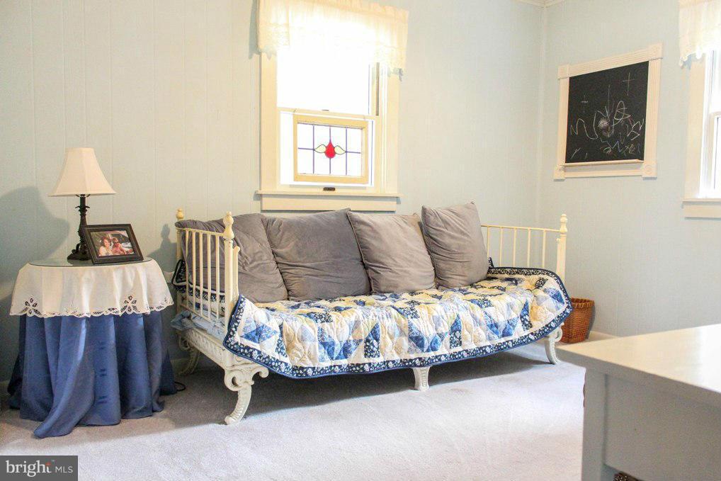 6401 Mackall Road St. Leonard, MD 20685 - Photo 28 of 30 a bedroom with a bed and a window