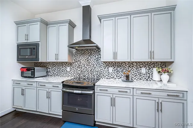 a bedroom with a bed chair and a window