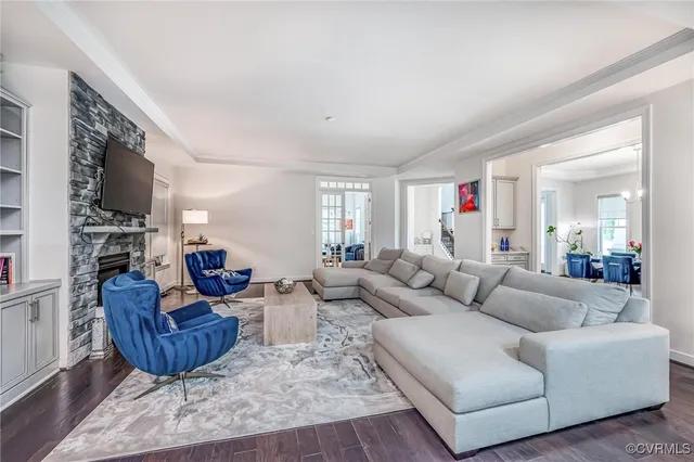 a view of a dining room with furniture and a window