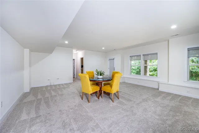 an aerial view of a house with a garden