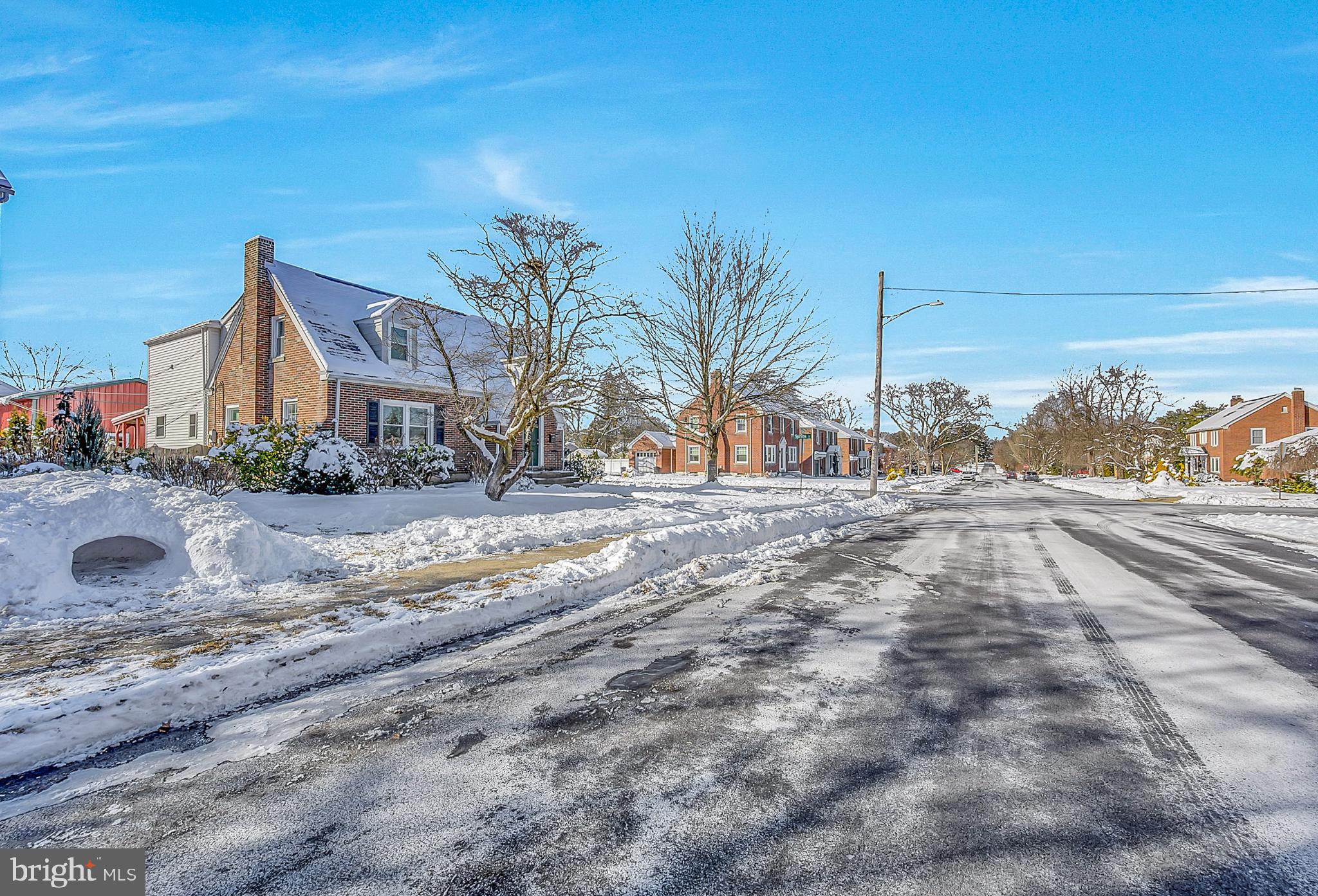 630 North 2nd Street Emmaus, PA 18049 - Photo 2 of 58 Charming winter street under a clear sky.