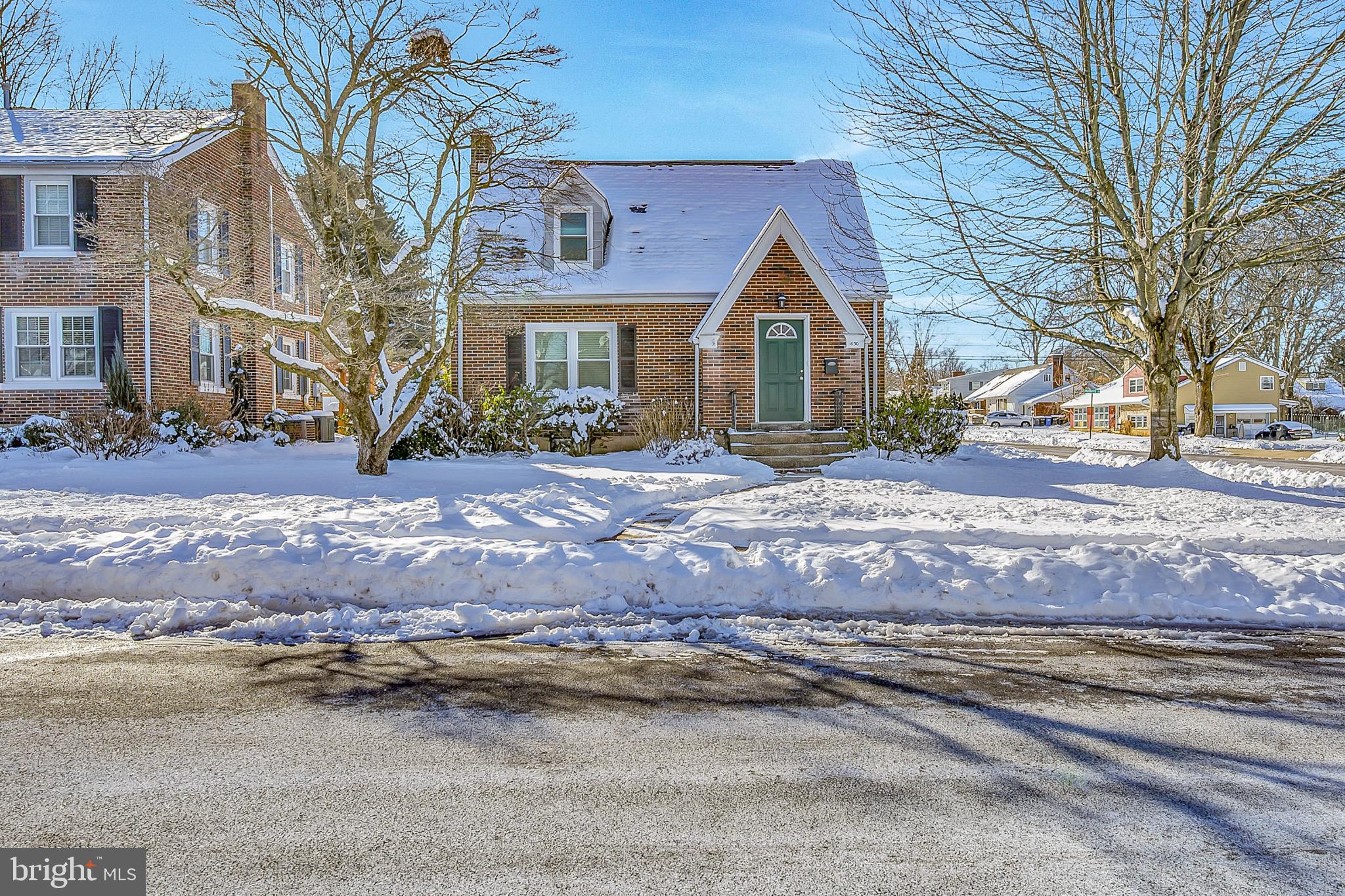 630 North 2nd Street Emmaus, PA 18049 - Photo 3 of 58 Charming home nestled in winter's embrace.