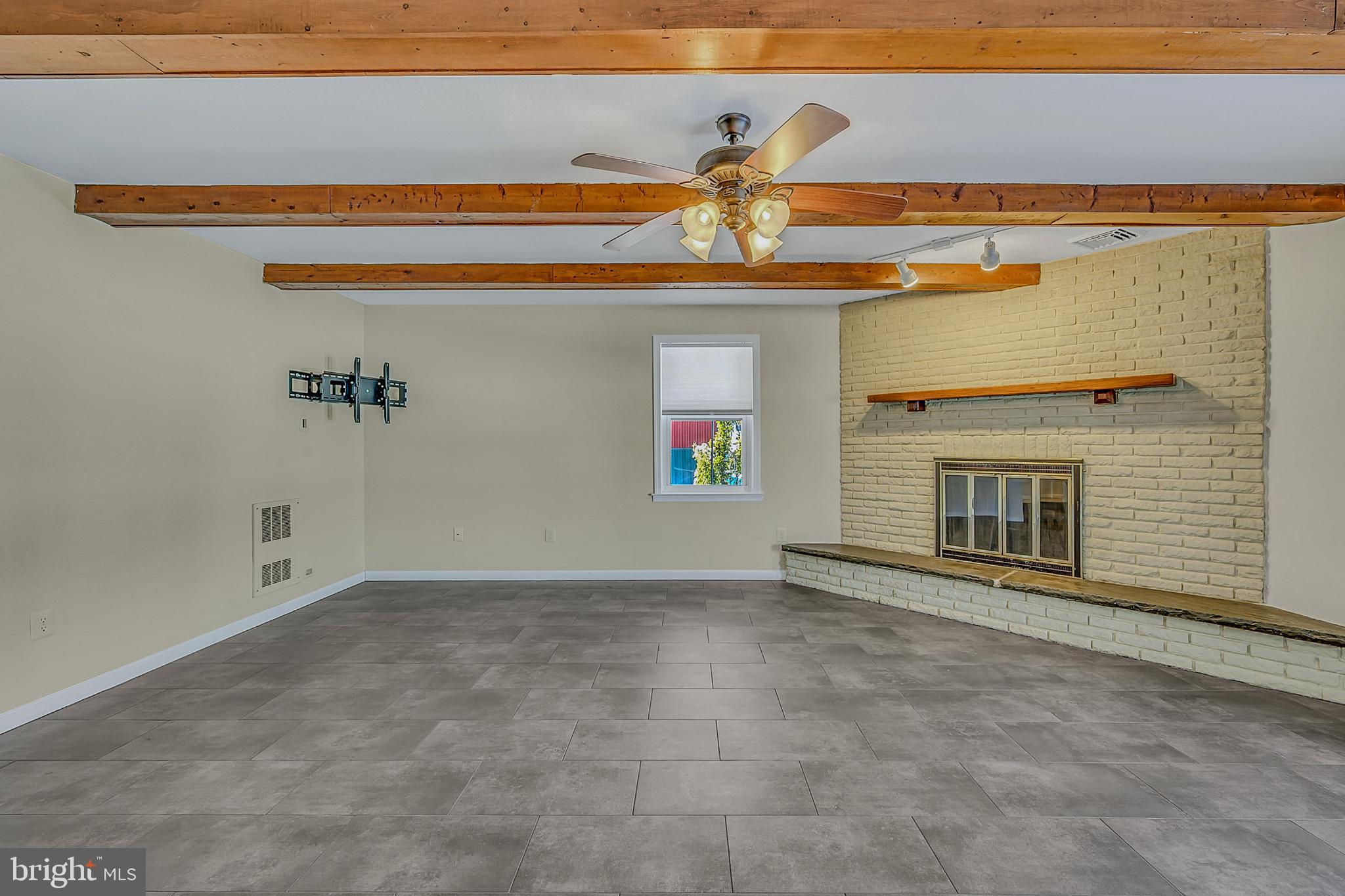 630 North 2nd Street Emmaus, PA 18049 - Photo 37 of 58 Spacious living area with charming beams.