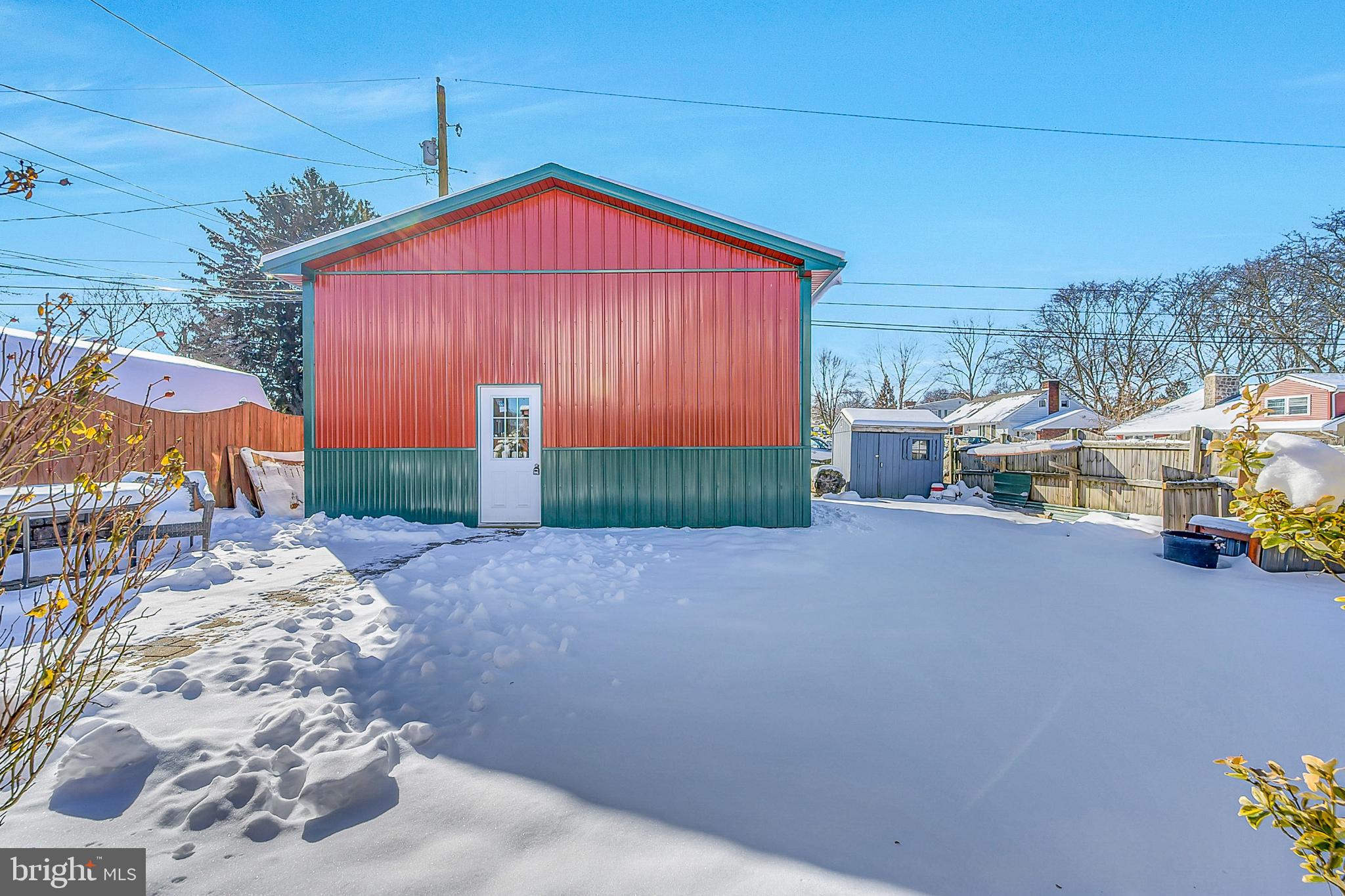 630 North 2nd Street Emmaus, PA 18049 - Photo 4 of 58 Garage nestled in a snowy landscape.