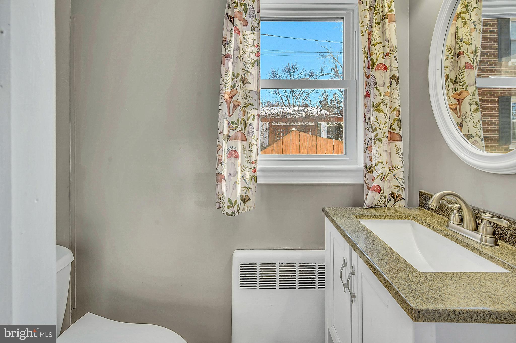 630 North 2nd Street Emmaus, PA 18049 - Photo 41 of 58 Bright and airy bathroom with floral accents.