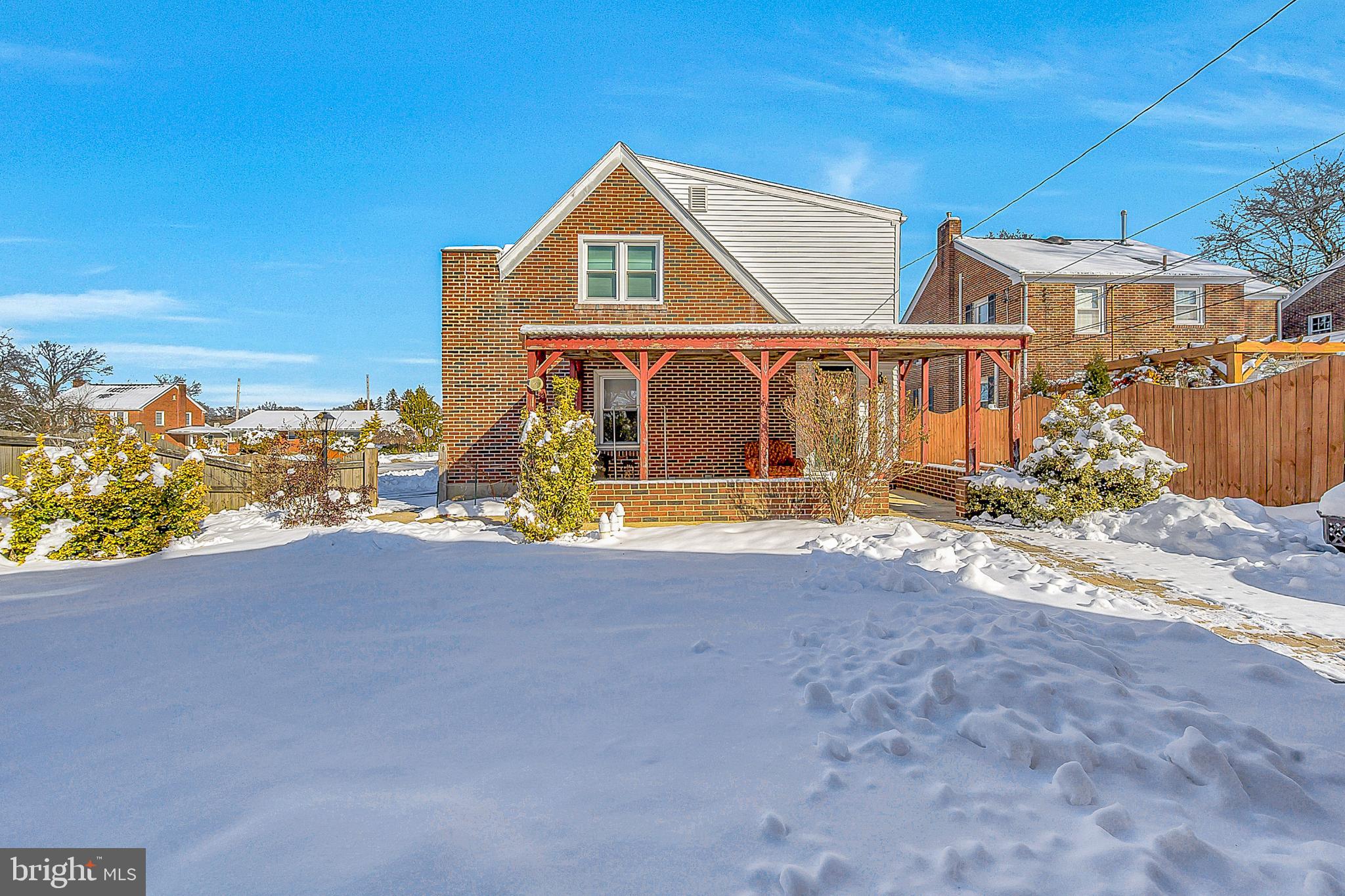 630 North 2nd Street Emmaus, PA 18049 - Photo 6 of 58 Charming home nestled in a snowy landscape.