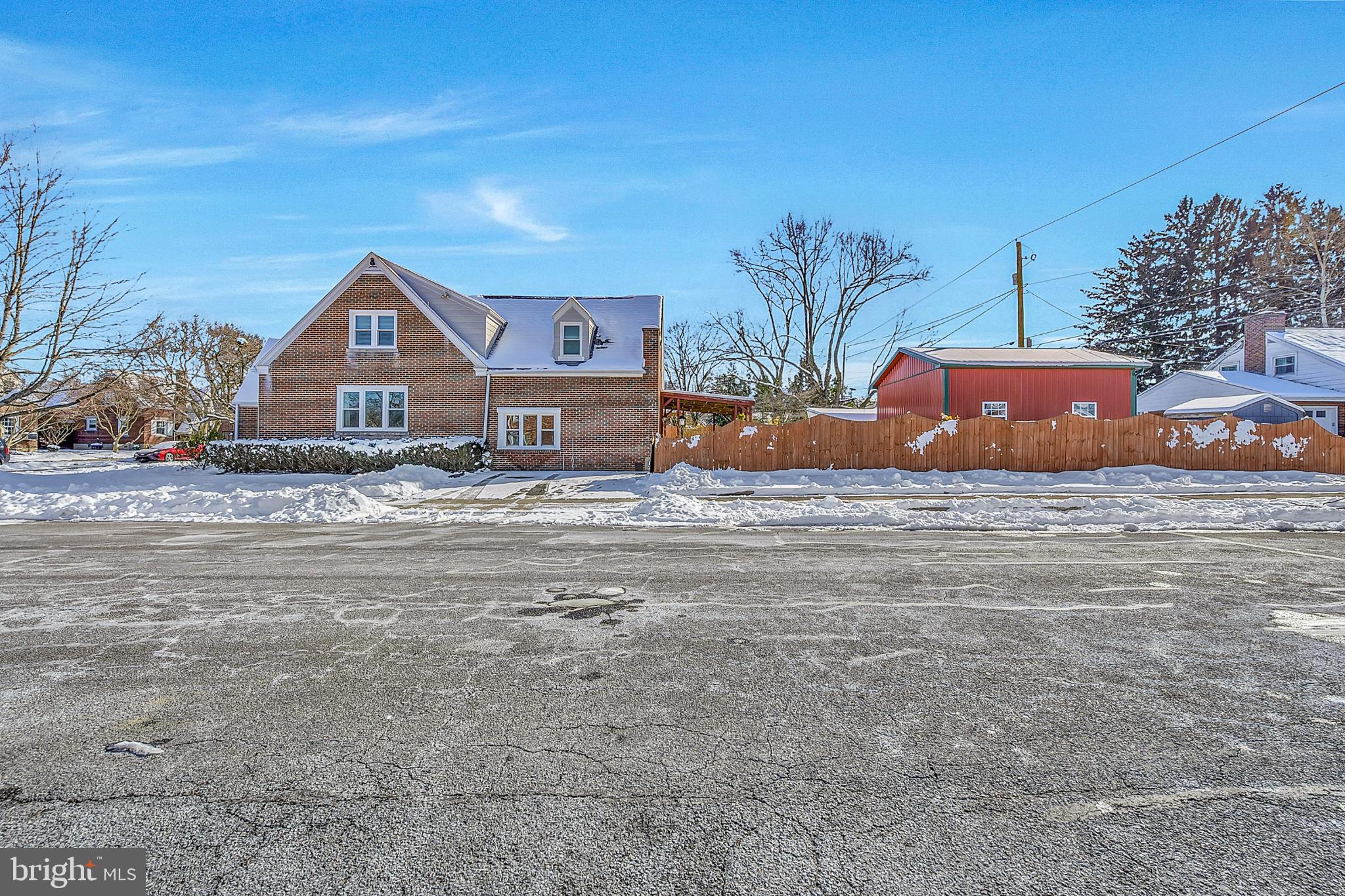 630 North 2nd Street Emmaus, PA 18049 - Photo 9 of 58 Charming home nestled in a winter landscape.