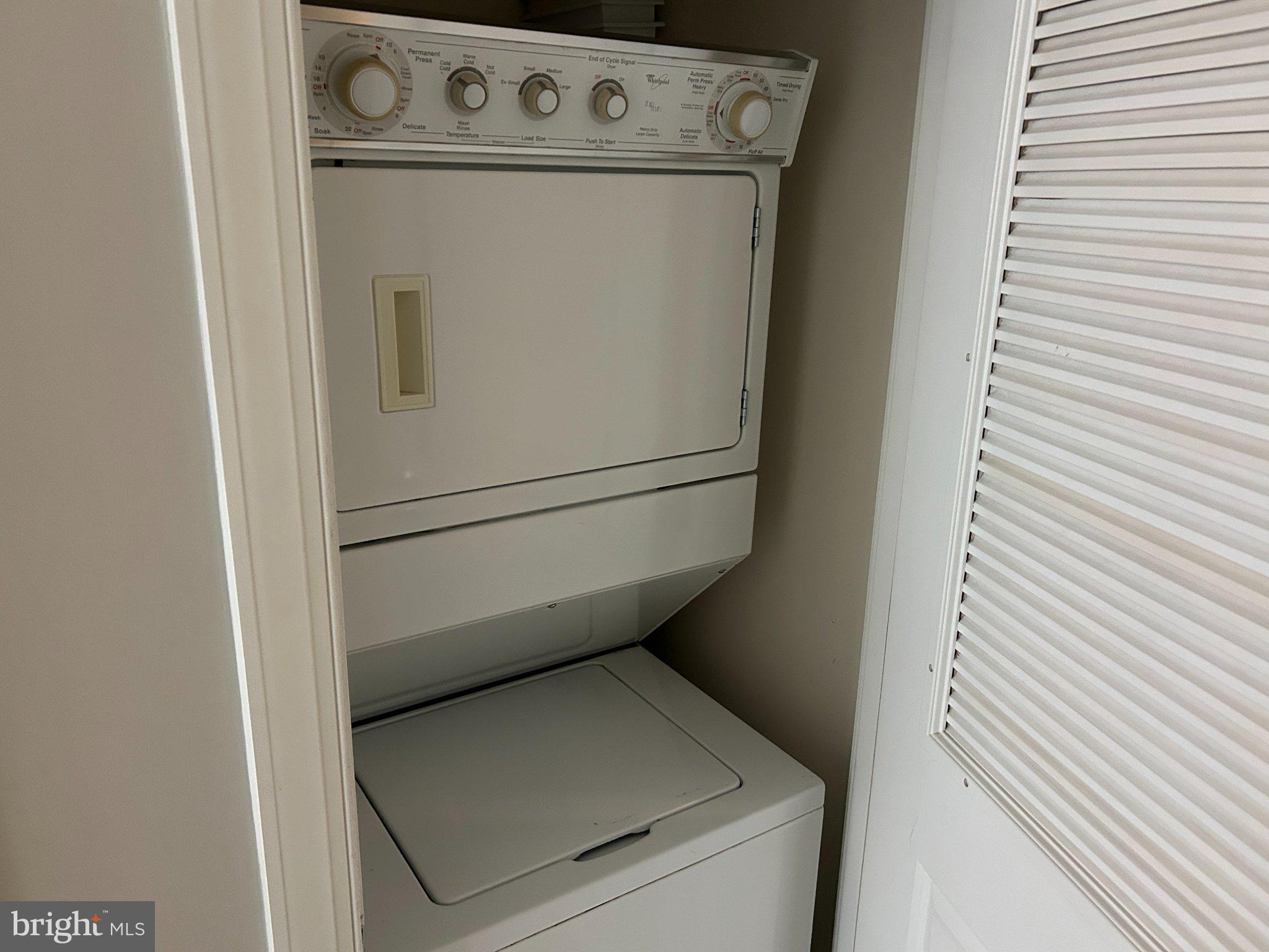 2425 L Street Northwest, Unit 421 Washington, DC 20037 - Photo 17 of 18 Compact laundry solution in a closet.