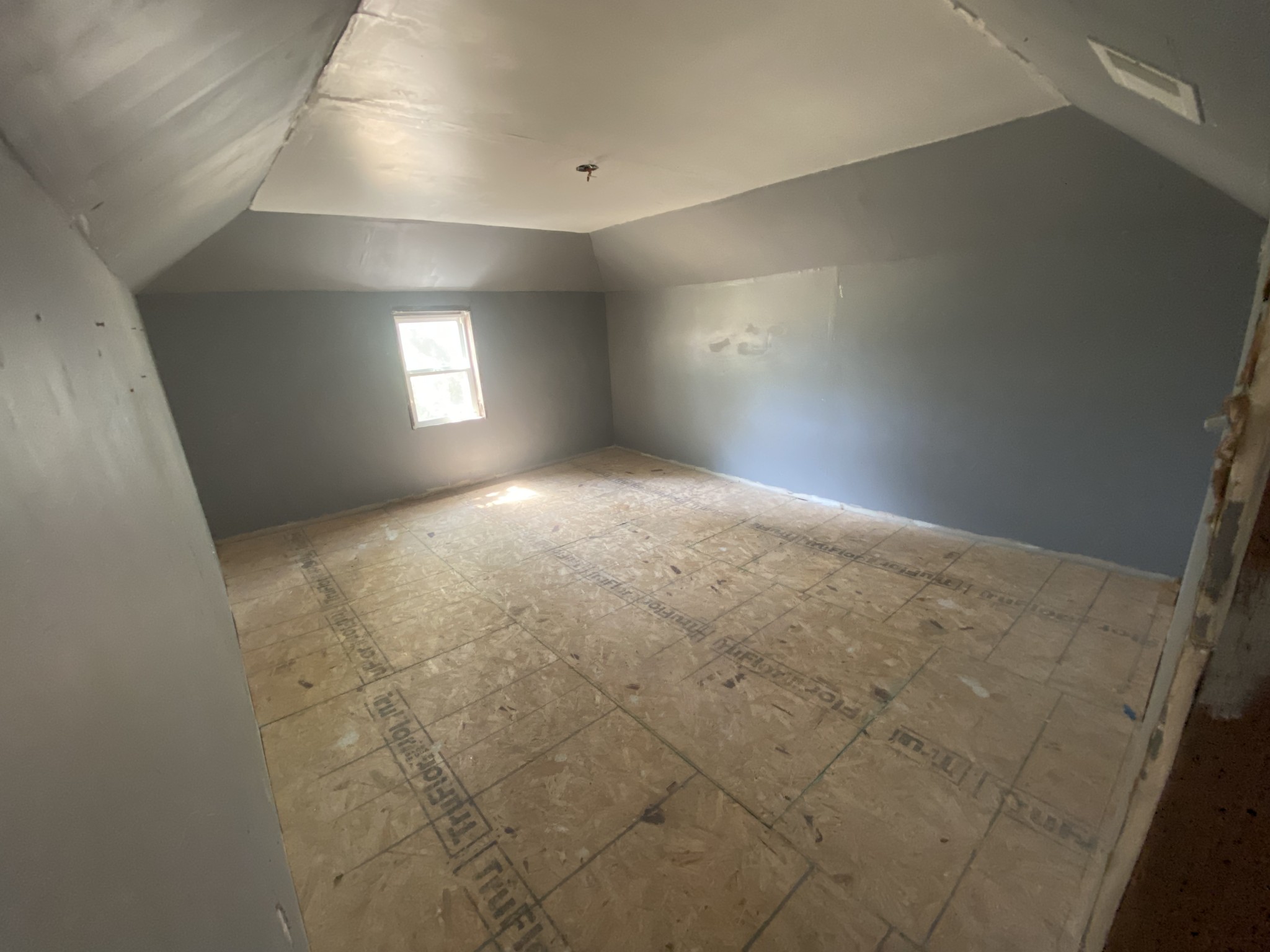 301 Bob Perry Road Bethpage, TN 37022 - Photo 13 of 23 an empty room with windows and fireplace