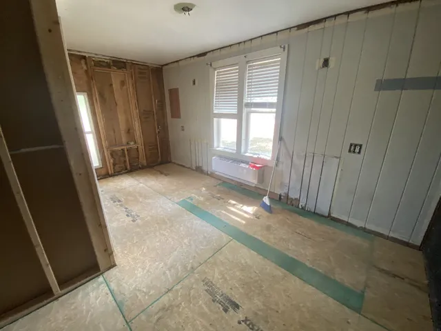 an empty room with windows