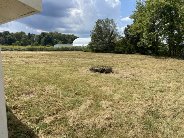 a white toilet sitting next to a sink