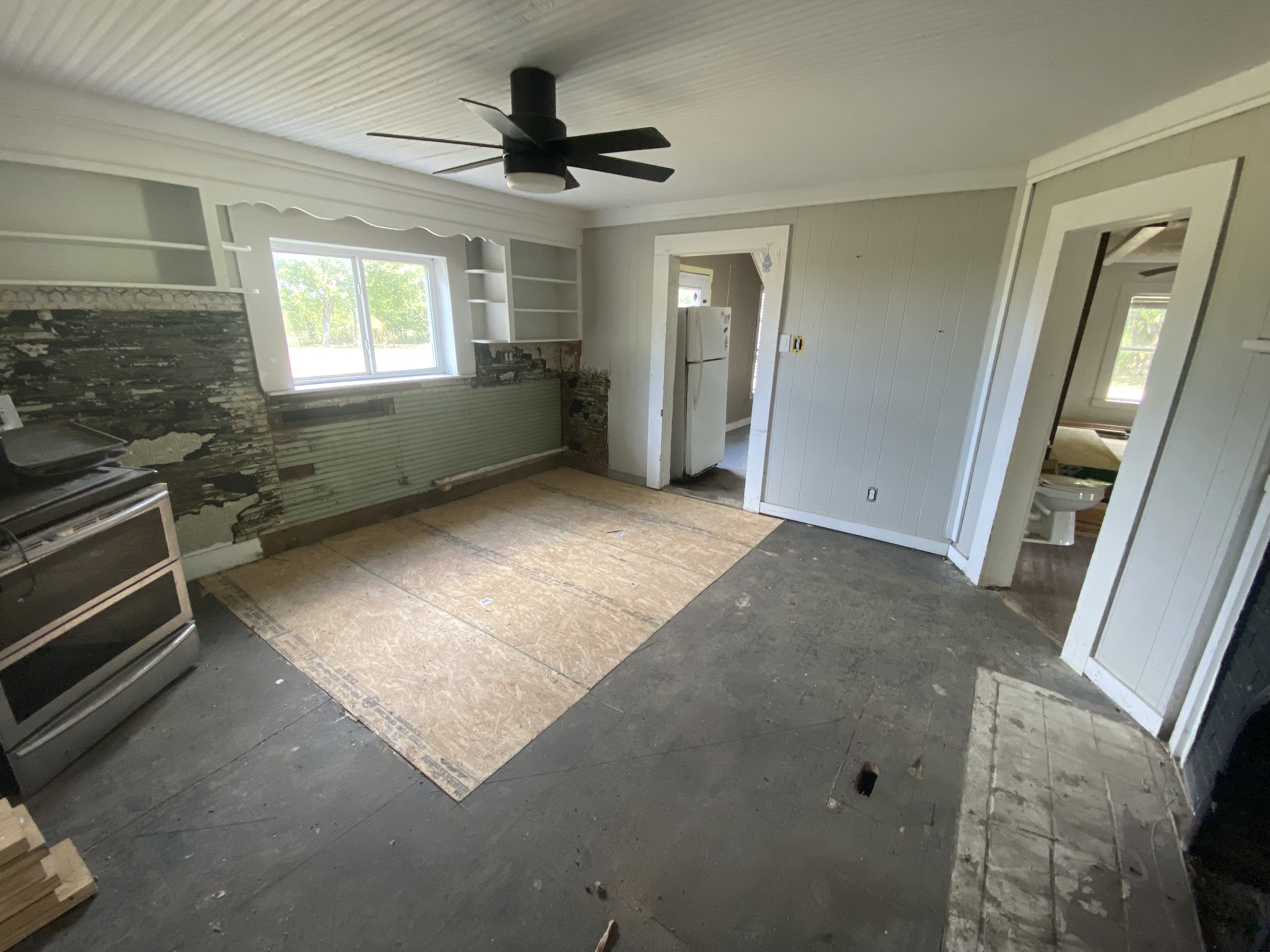 301 Bob Perry Road Bethpage, TN 37022 - Photo 5 of 23 wooden floor in an empty room with a window
