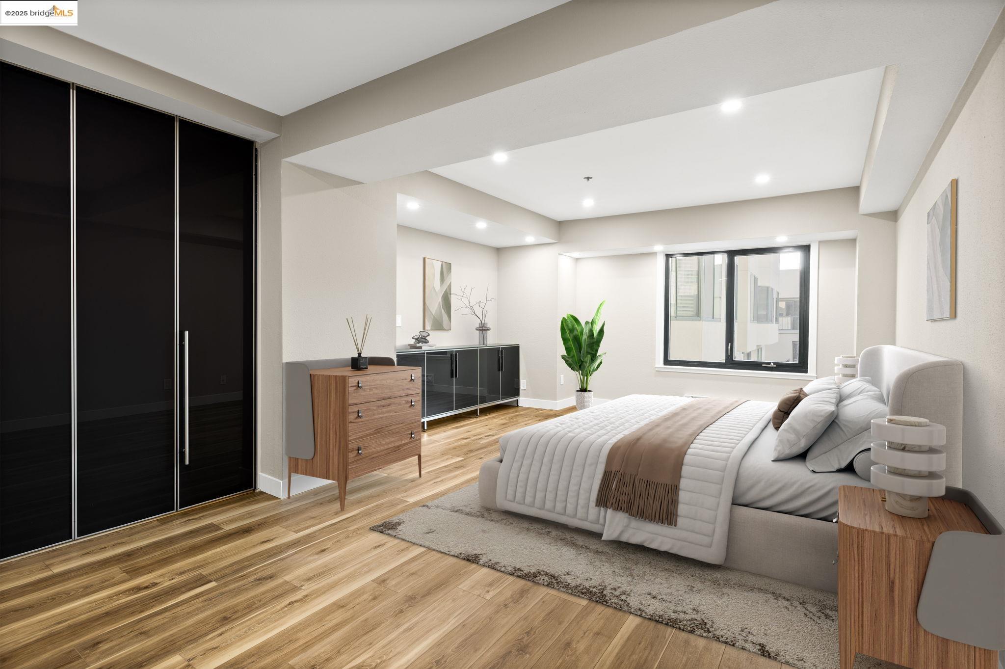 601 Van Ness Avenue, Unit 441 San Francisco, CA 94102 - Photo 19 of 58 a bedroom with a large bed and a window