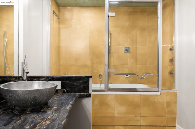 a large tub sitting next to a window