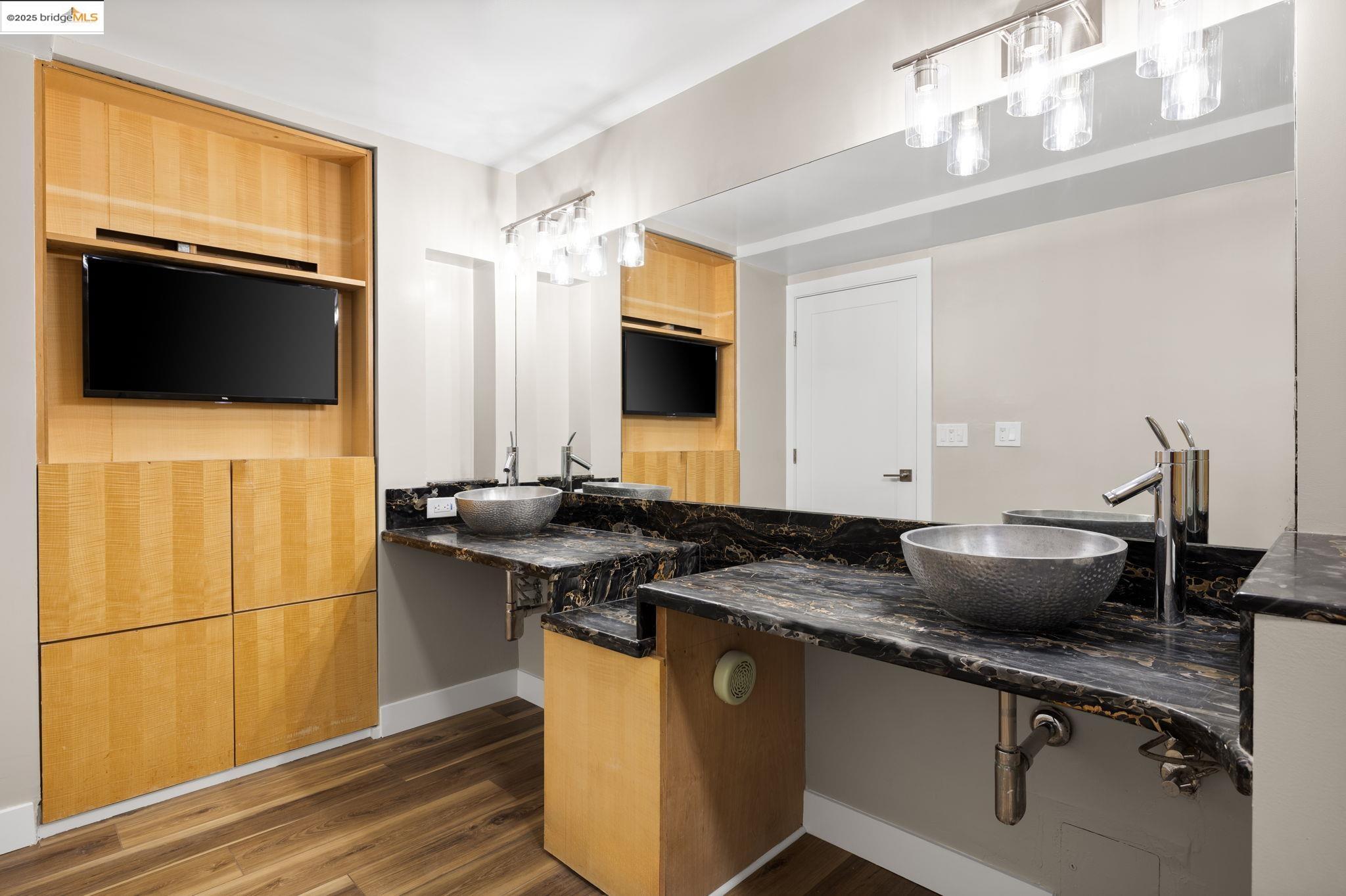 601 Van Ness Avenue, Unit 441 San Francisco, CA 94102 - Photo 27 of 58 a kitchen with a sink and a refrigerator