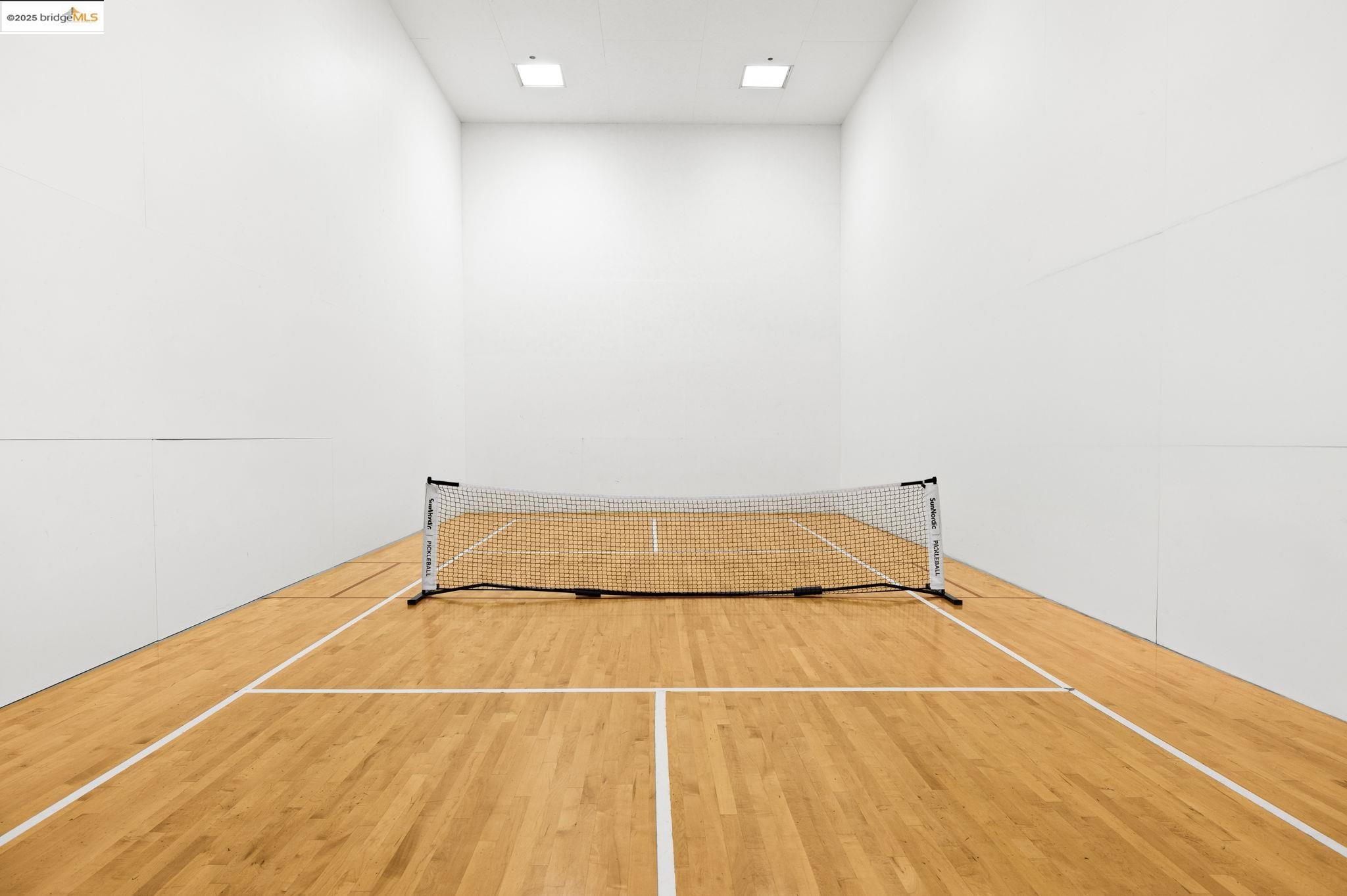 601 Van Ness Avenue, Unit 441 San Francisco, CA 94102 - Photo 32 of 58 a view of a room with wooden floor