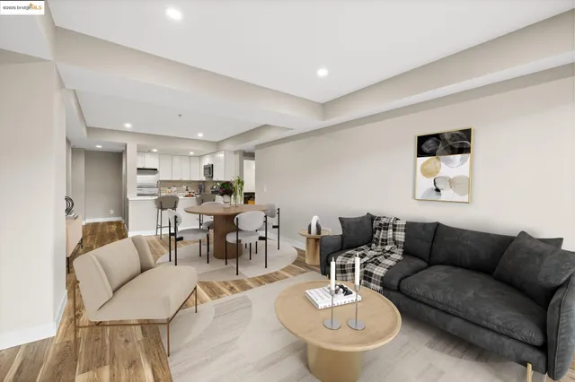 a living room with furniture and white walls