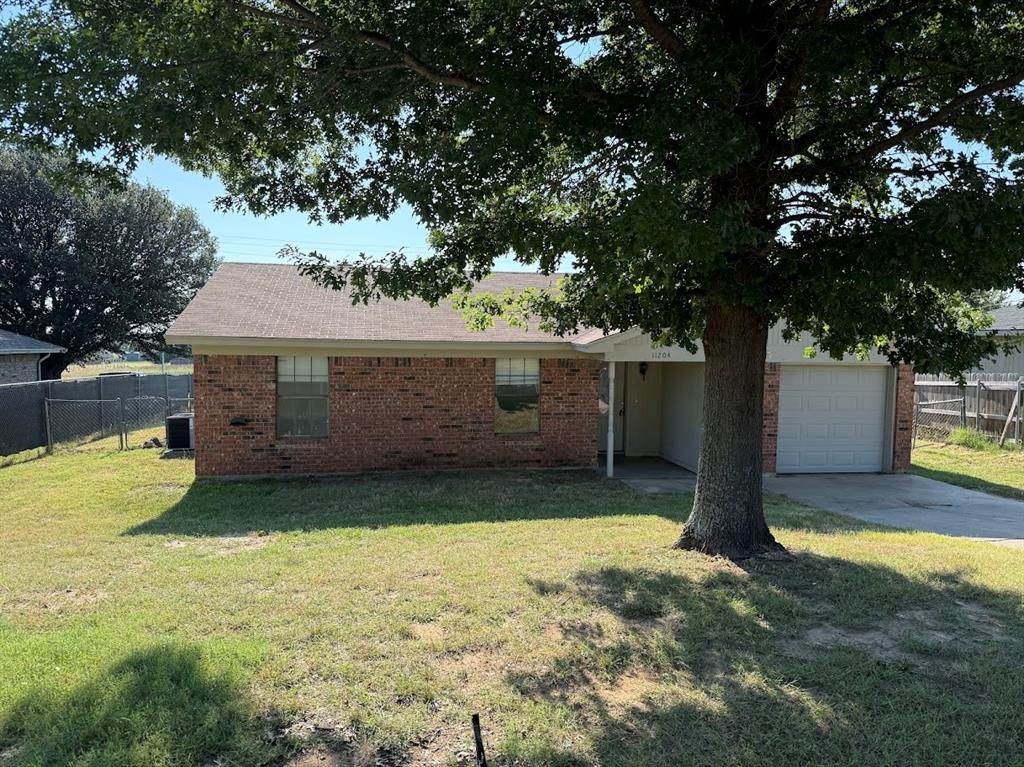 11204 Liberty School Road Pelican Bay, TX 76020 - Photo 1 of 23 a view of a backyard