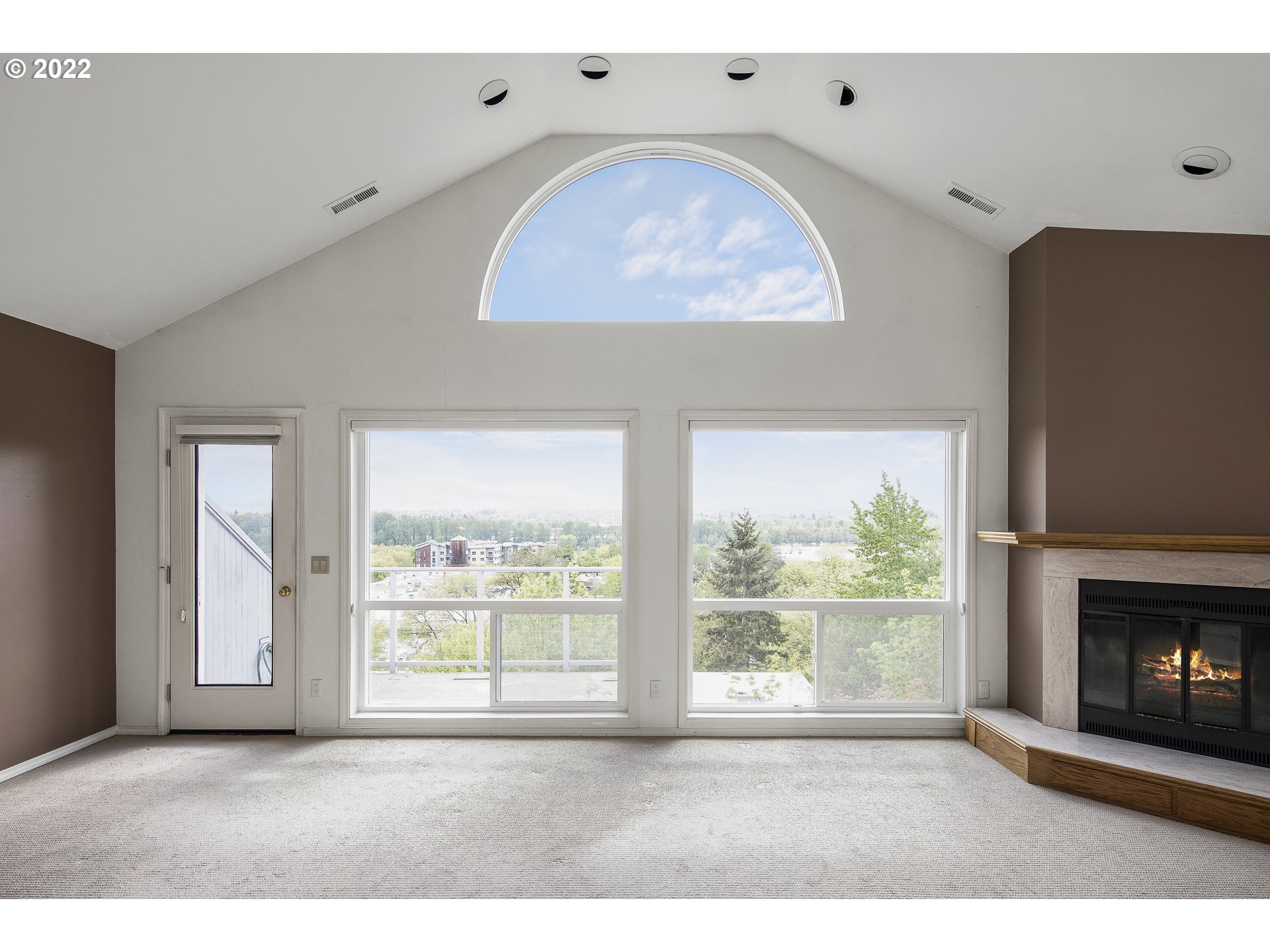 5439 Southwest View Point Terrace Portland, OR 97239 - Photo 2 of 19 a view of an empty room with a fireplace