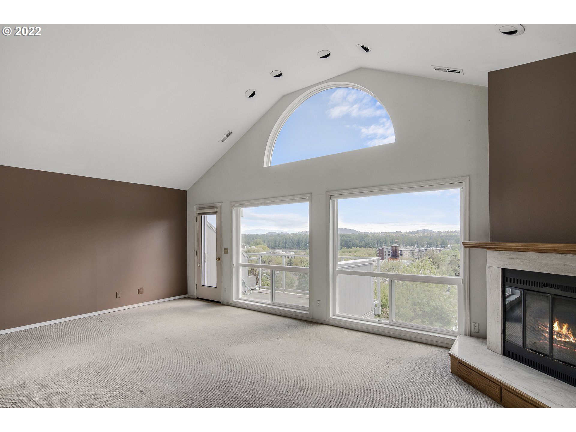 5439 Southwest View Point Terrace Portland, OR 97239 - Photo 3 of 19 a view of an empty room with a fireplace
