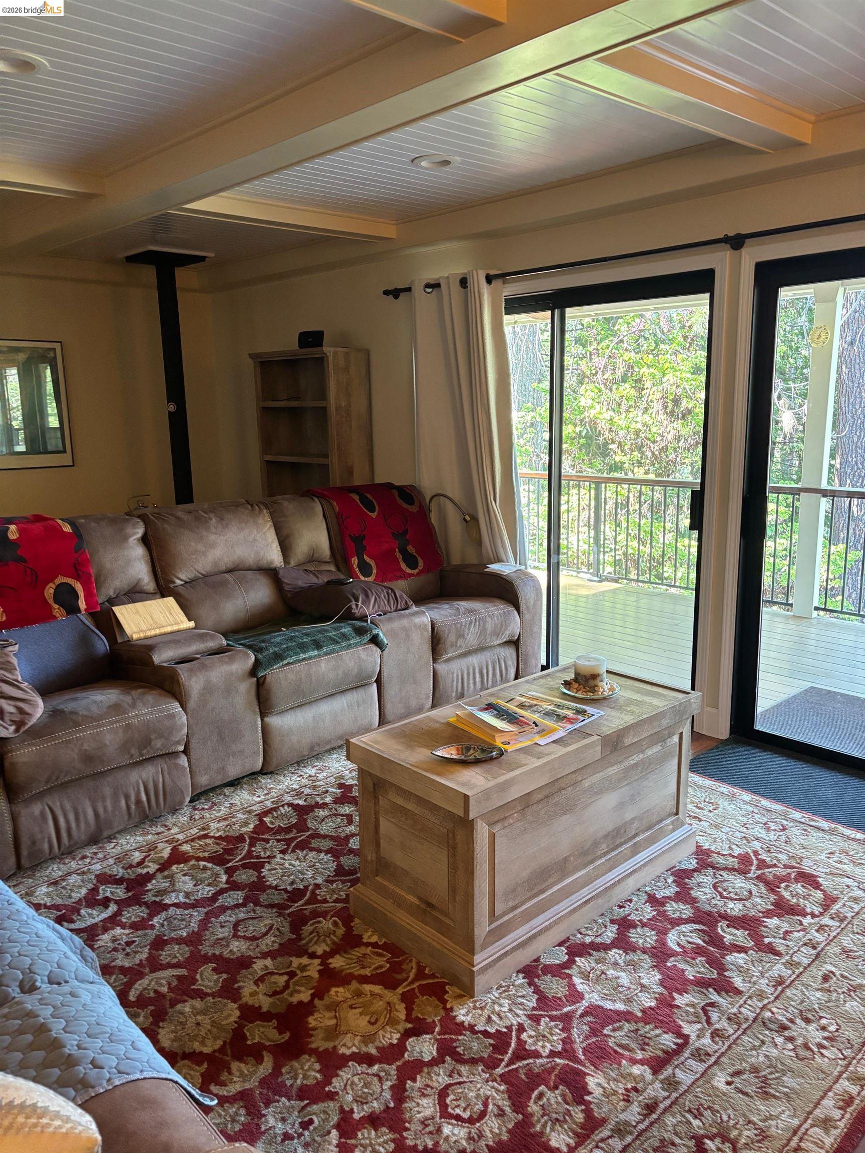 20728 Point View Drive Groveland, CA 95321 - Photo 12 of 45 a living room with furniture and a rug