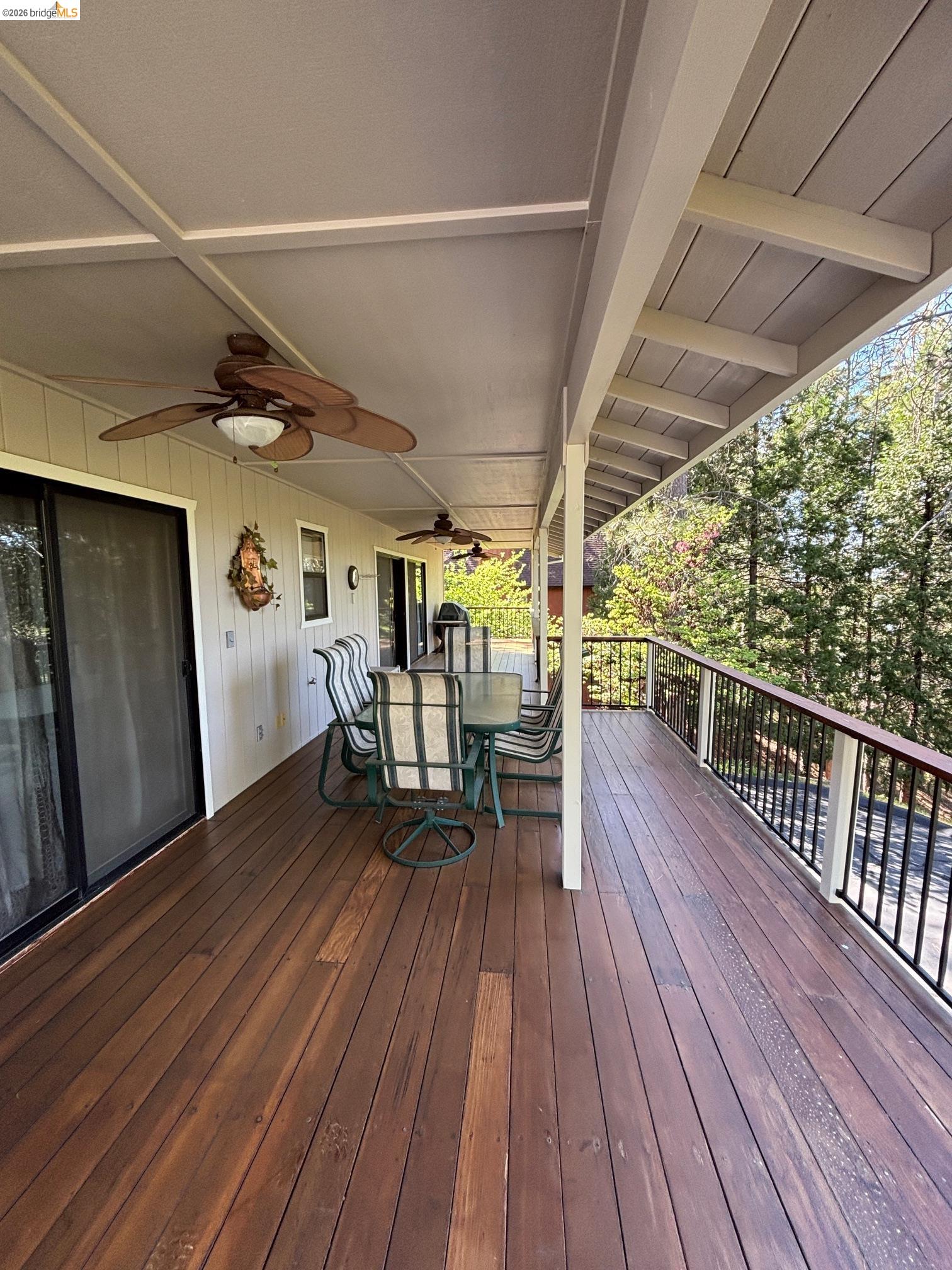 20728 Point View Drive Groveland, CA 95321 - Photo 16 of 45 a view of a chairs and table on the wooden floor