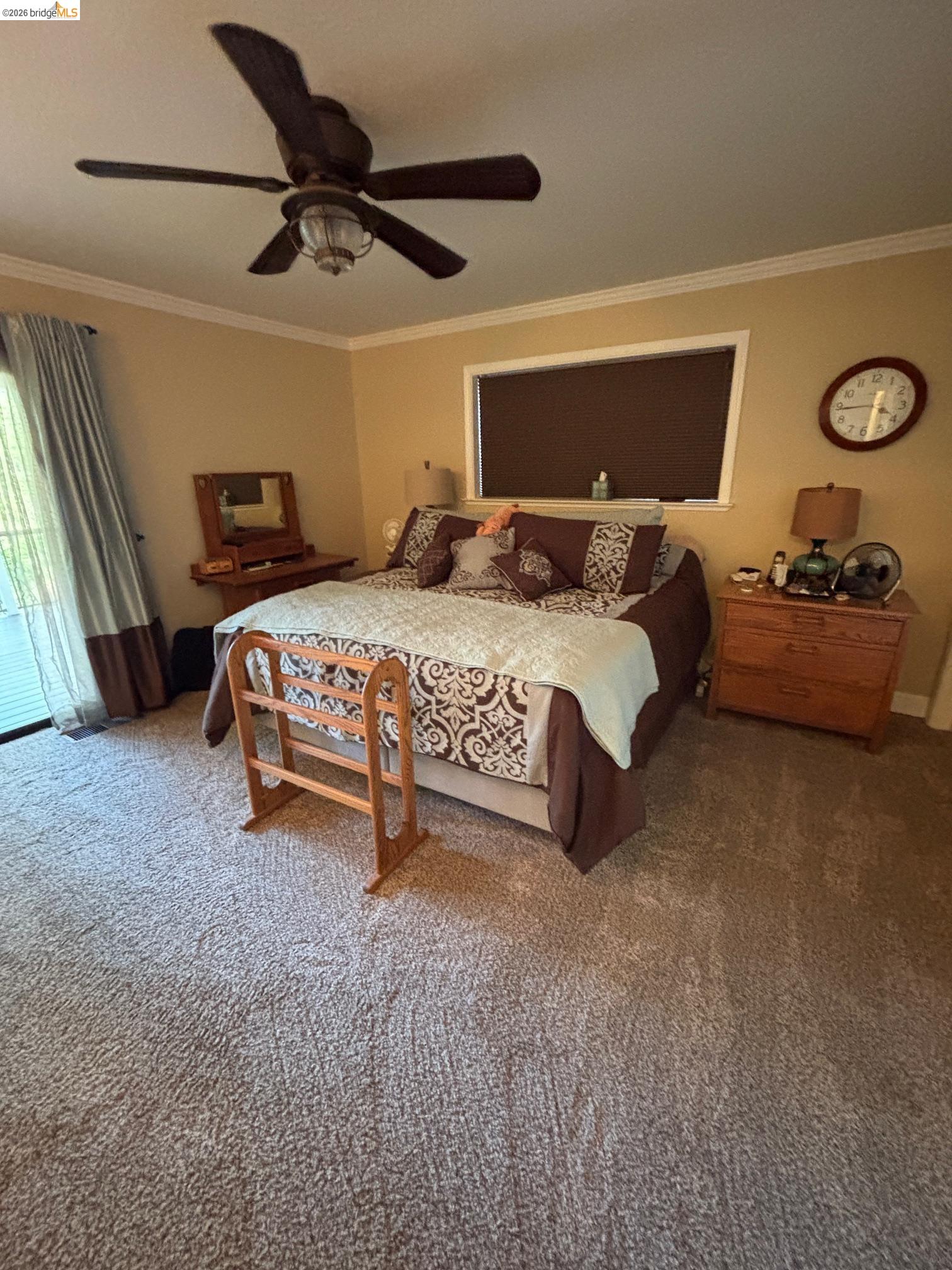20728 Point View Drive Groveland, CA 95321 - Photo 18 of 45 a bed sitting in a bedroom next to a window