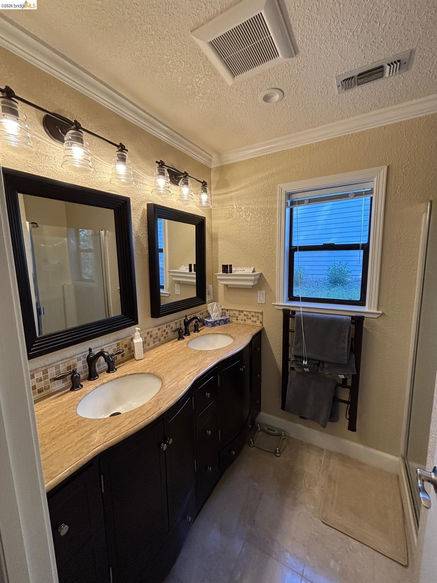 20728 Point View Drive Groveland, CA 95321 - Photo 22 of 45 a bathroom with a double vanity sink and a mirror