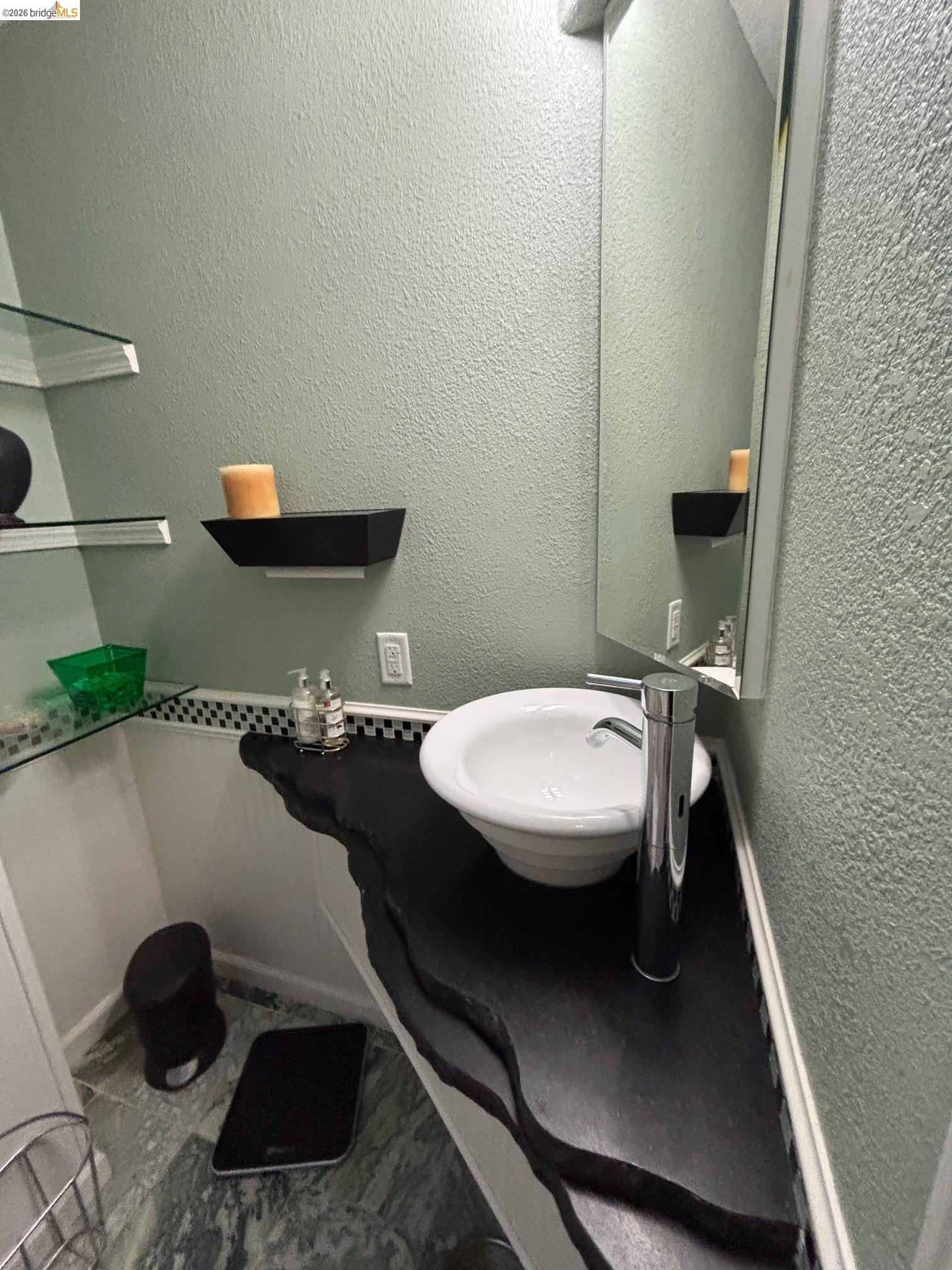 20728 Point View Drive Groveland, CA 95321 - Photo 30 of 45 a bathroom with a sink and a mirror