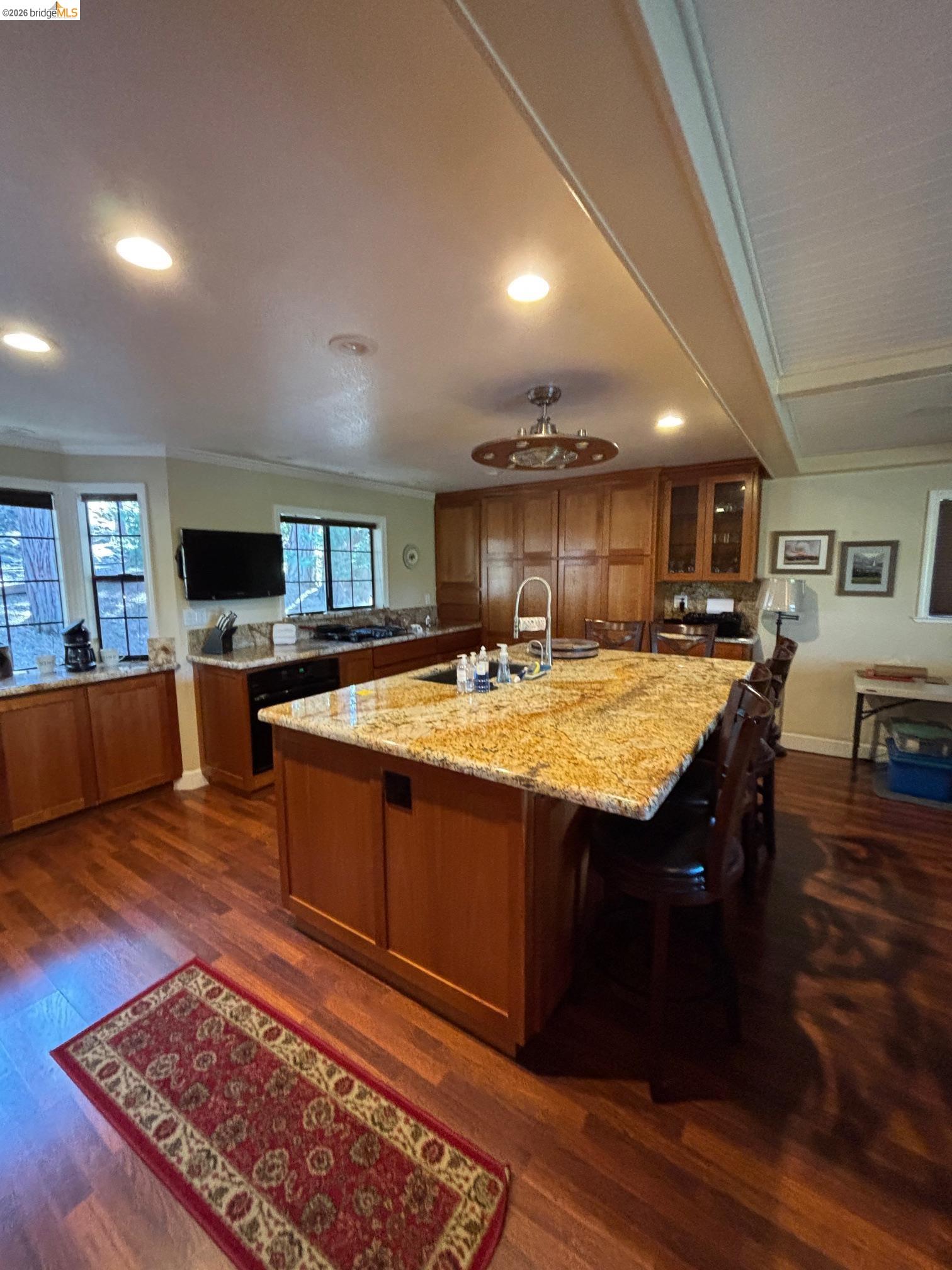 20728 Point View Drive Groveland, CA 95321 - Photo 9 of 45 a living room with stainless steel appliances granite countertop furniture wooden floor and a kitchen view