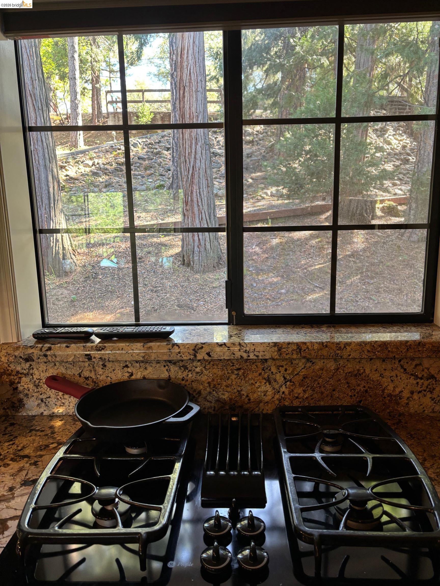 20728 Point View Drive Groveland, CA 95321 - Photo 10 of 45 a bathroom with a granite countertop sink and a window