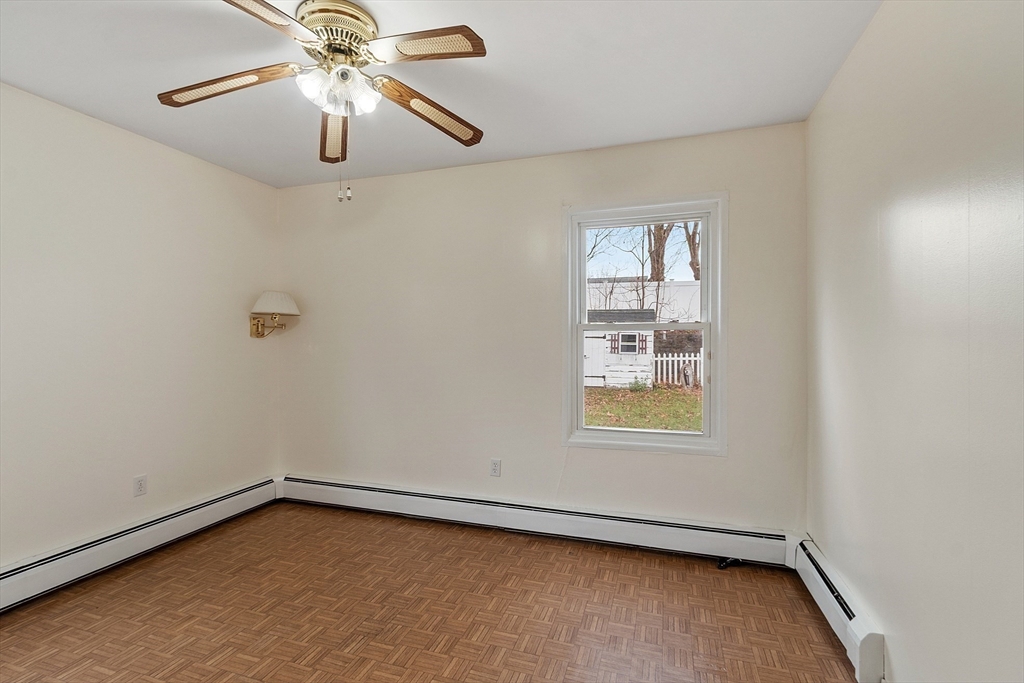 5 Sherman Avenue Haverhill, MA 01832 - Photo 17 of 26 an empty room with a window and a fan