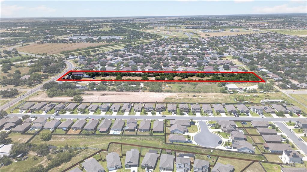 8900 North Ware Road McAllen, TX 78504 - Photo 13 of 13 Expansive land parcel outlined in red, featuring significant frontage along a main roadway
