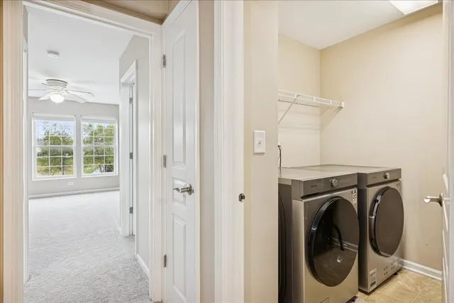 a bathroom with a granite countertop sink a toilet and a shower