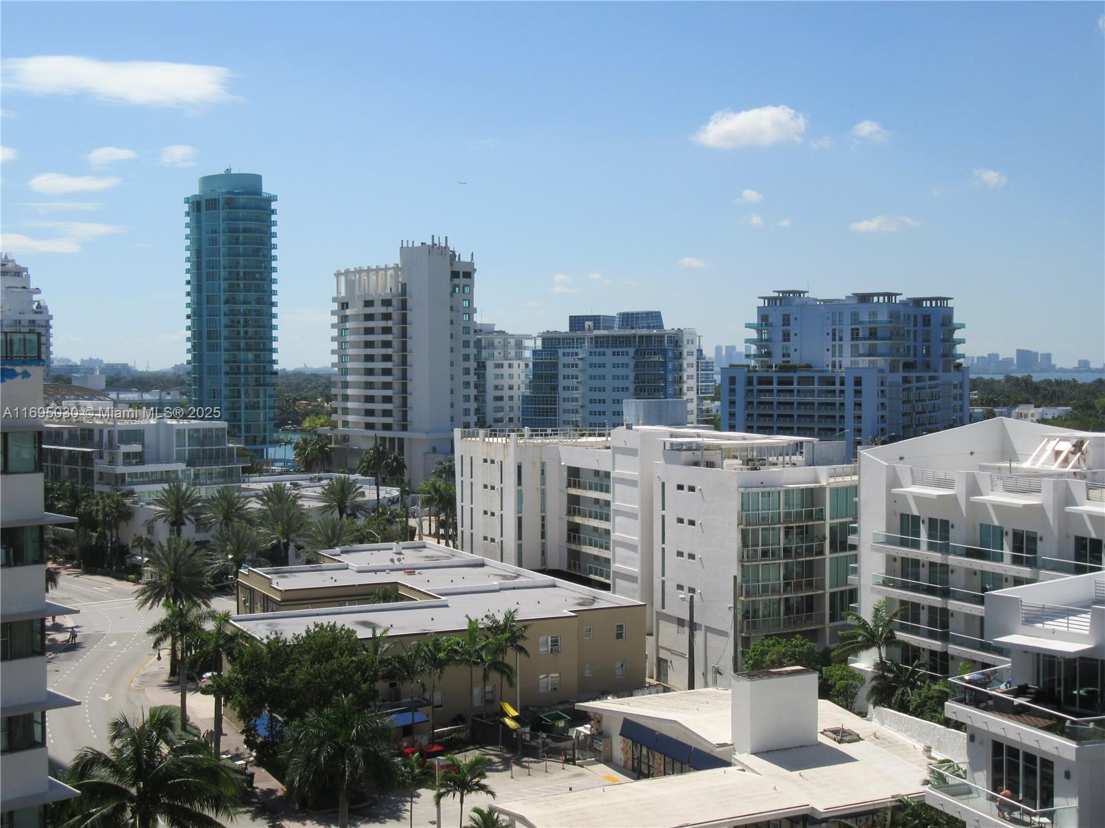 6365 Collins Avenue, Unit 1008 Miami Beach, FL 33141 - Photo 31 of 49 a view of a city with tall buildings