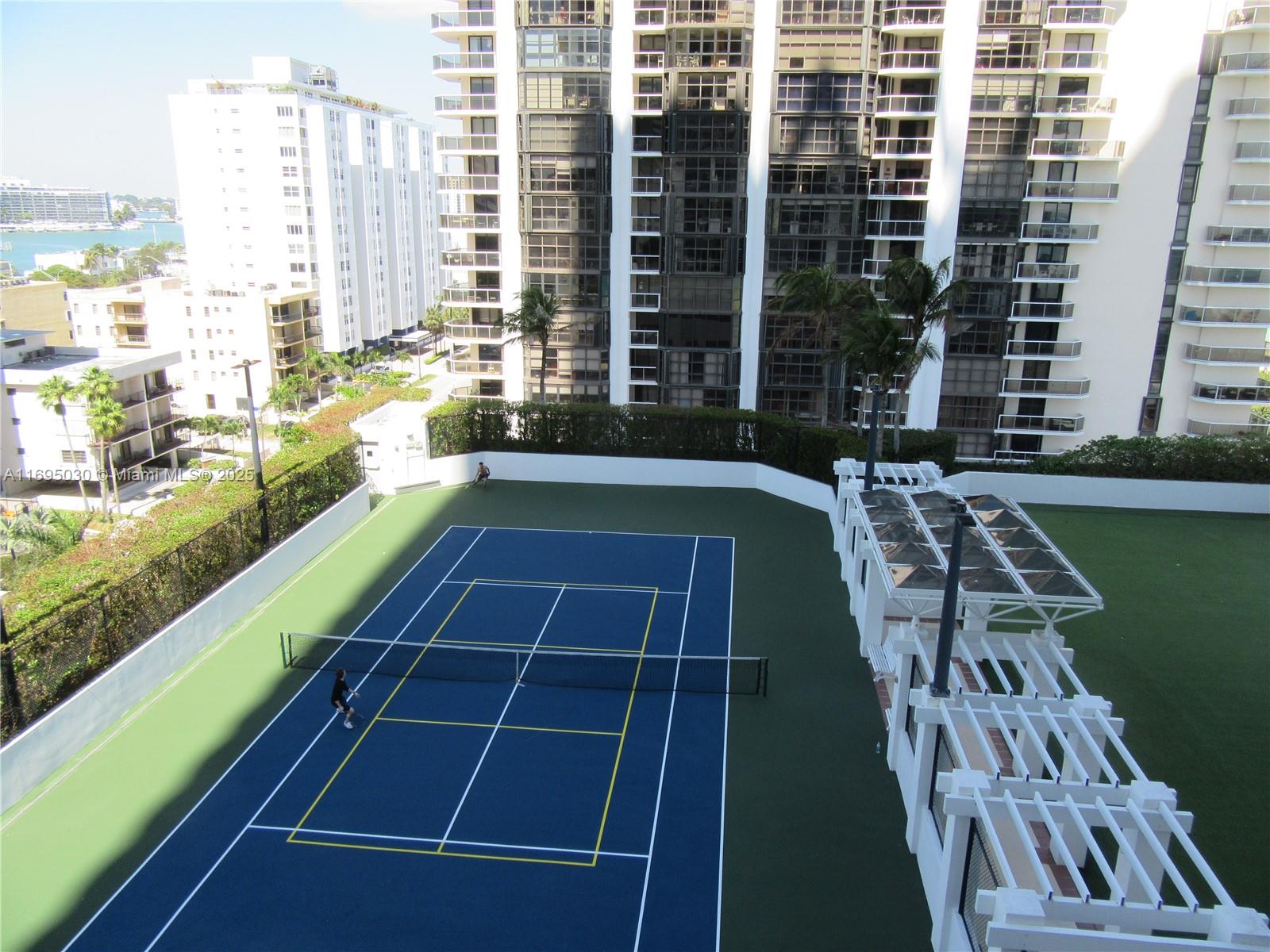 6365 Collins Avenue, Unit 1008 Miami Beach, FL 33141 - Photo 34 of 49 city view with tall buildings