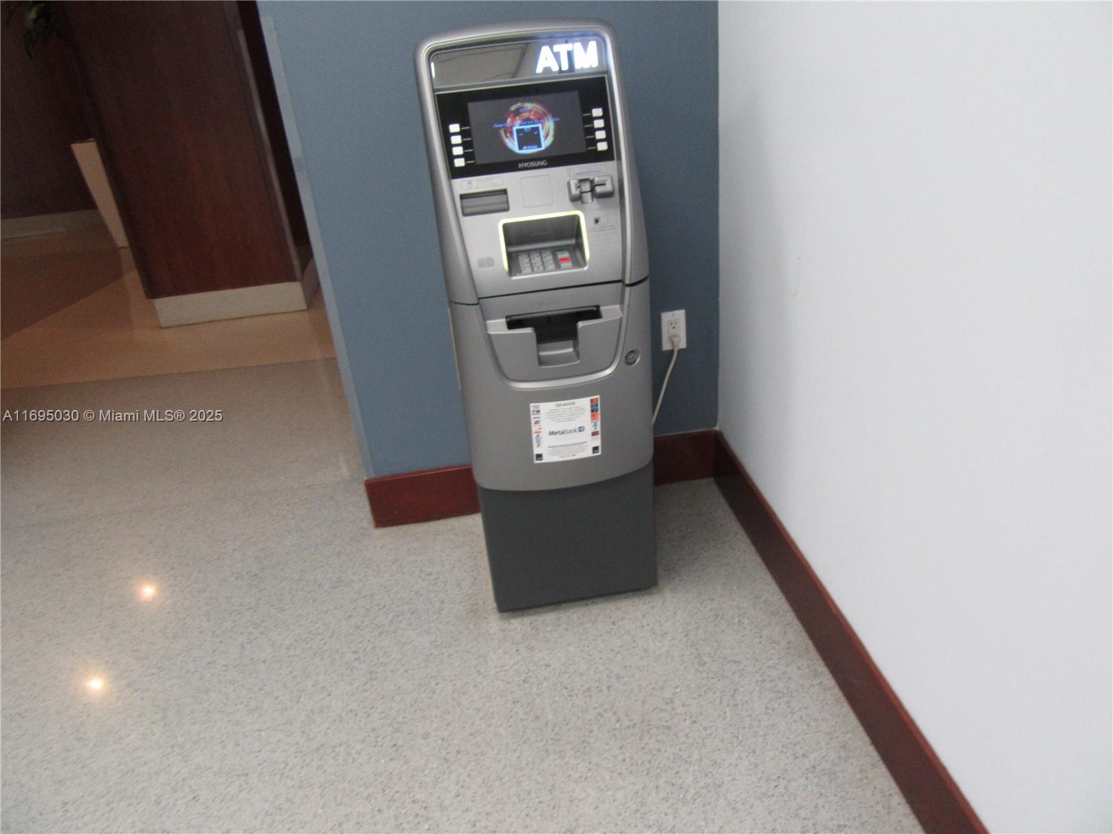 6365 Collins Avenue, Unit 1008 Miami Beach, FL 33141 - Photo 46 of 49 a view of an entryway with wooden floor